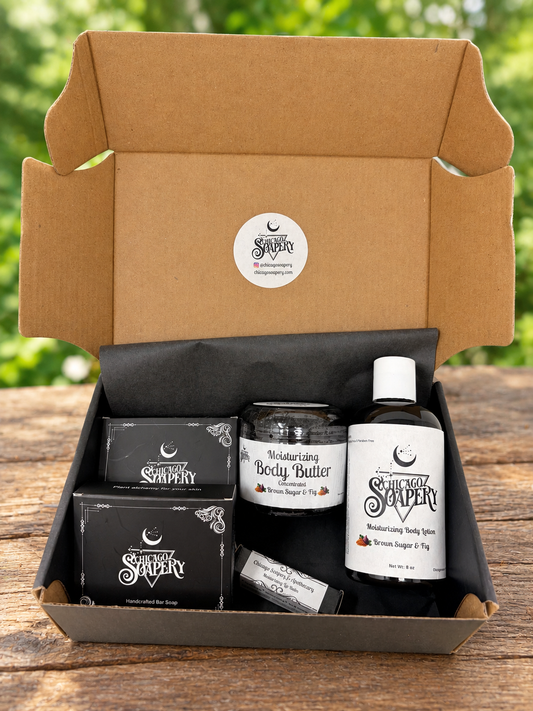 Open Brown Sugar & Fig handmade gift box with two boxed soaps, body butter, lotion, and lip balm